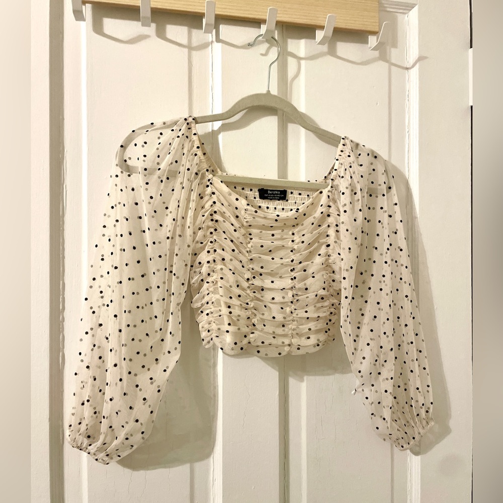 Bershka White and black polka dot top from ASOS.